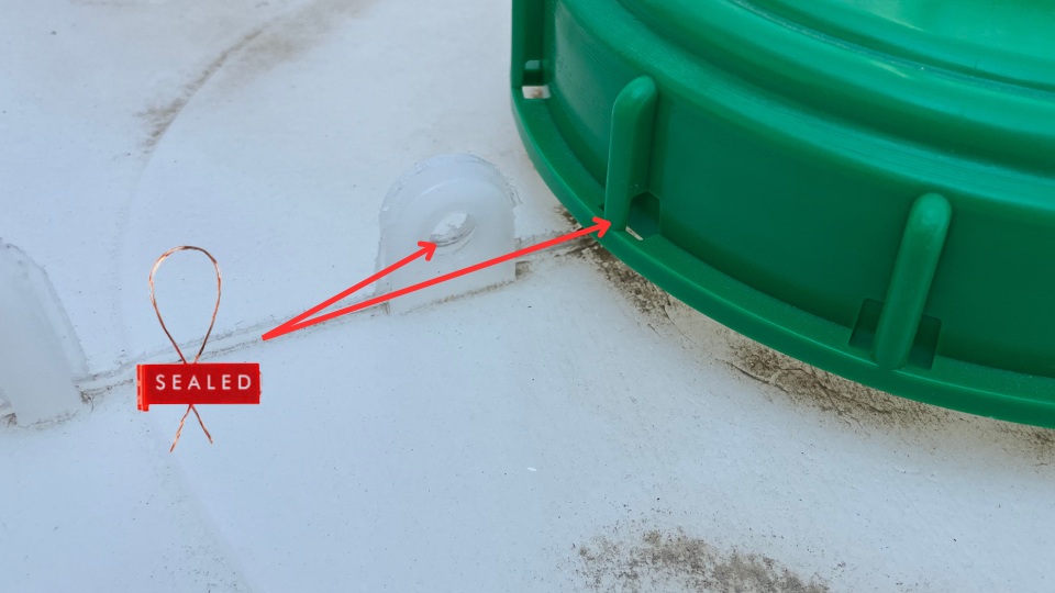 A wire used for securing a cage tank, shown in a close-up view to highlight the wire's thickness and durability.