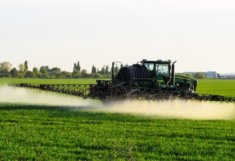 Tractor Sprayer in Field